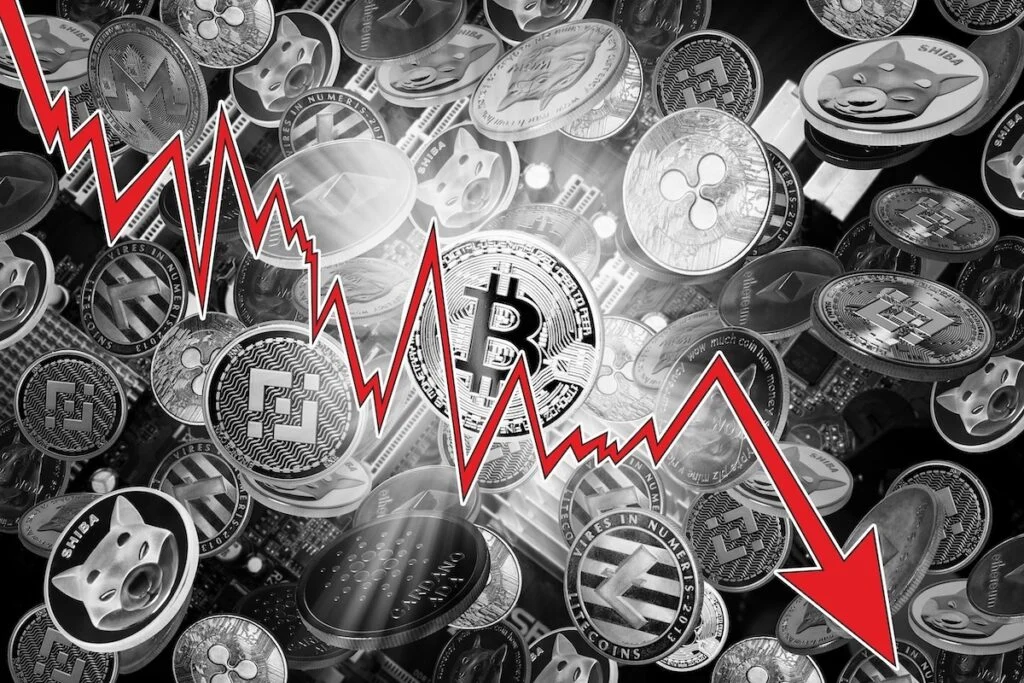 Bitcoin Slides To $65,000 As Liquidations Hit $2 Billion; Ethereum, Dogecoin Sink, XRP Holds Steady