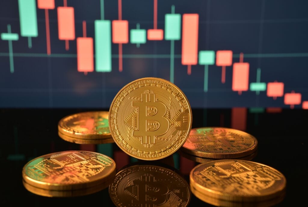 Bitcoin, Dogecoin Gain; Ethereum, XRP Slide Amid Trump's Latest Warning to Iran: Analyst Says BTC 'Bottom' Not Yet Confirmed