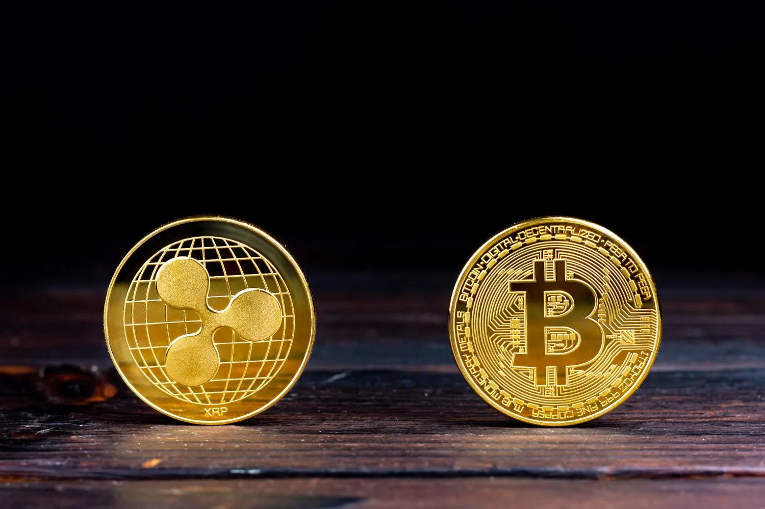 Ripple Drops 6%, Bitcoin Falls 5% in Crypto Pullback Defying Stock Rally