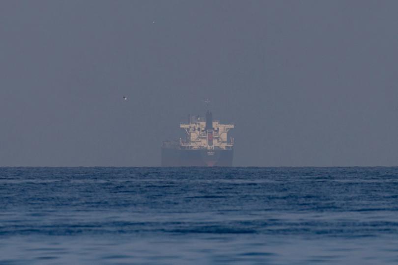 Bitcoin loses $77,000, ether, solana slide as Hormuz standoff lifts oil to 3-week high