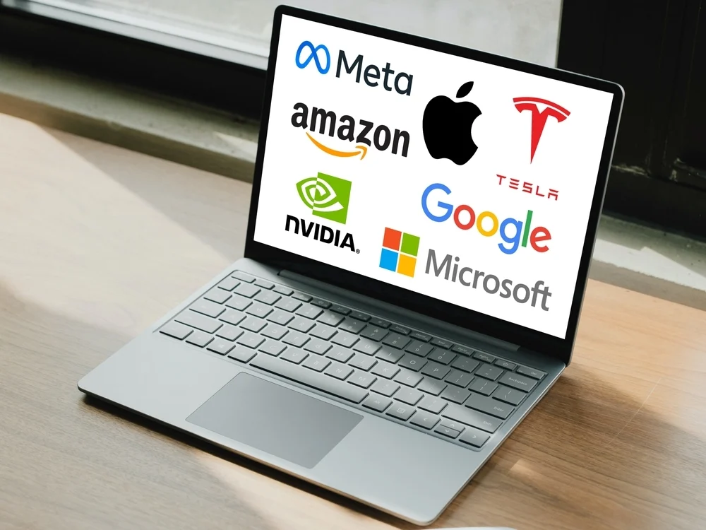 EXCLUSIVE: Nvidia Vs. Alphabet: Benzinga Viewers, Prediction Markets Disagree On The Most Valuable Mag 7 Stock By 2026
