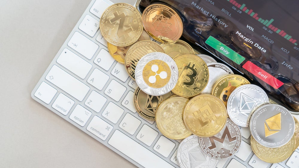 Bitcoin Hits $62,000, Ethereum, XRP, Dogecoin Slide More Than 4% As Dollar Climbs To Multi-Month High