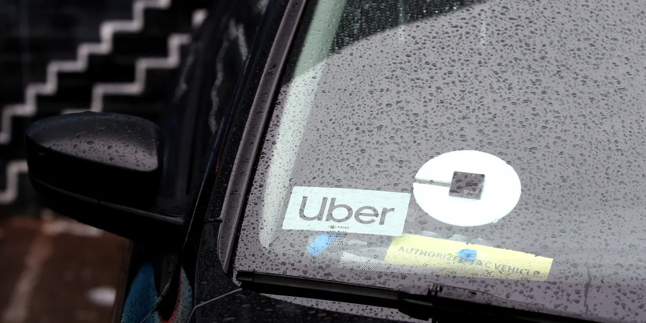 Uber Wants to Be a One-Stop Travel App. Expedia Is on Board.