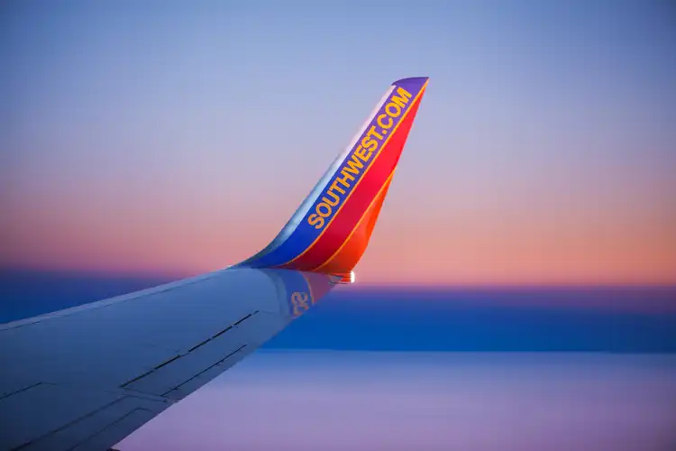 Southwest Airlines rallies after announcing it will charge for checked bags, setting new cost-cutting targets