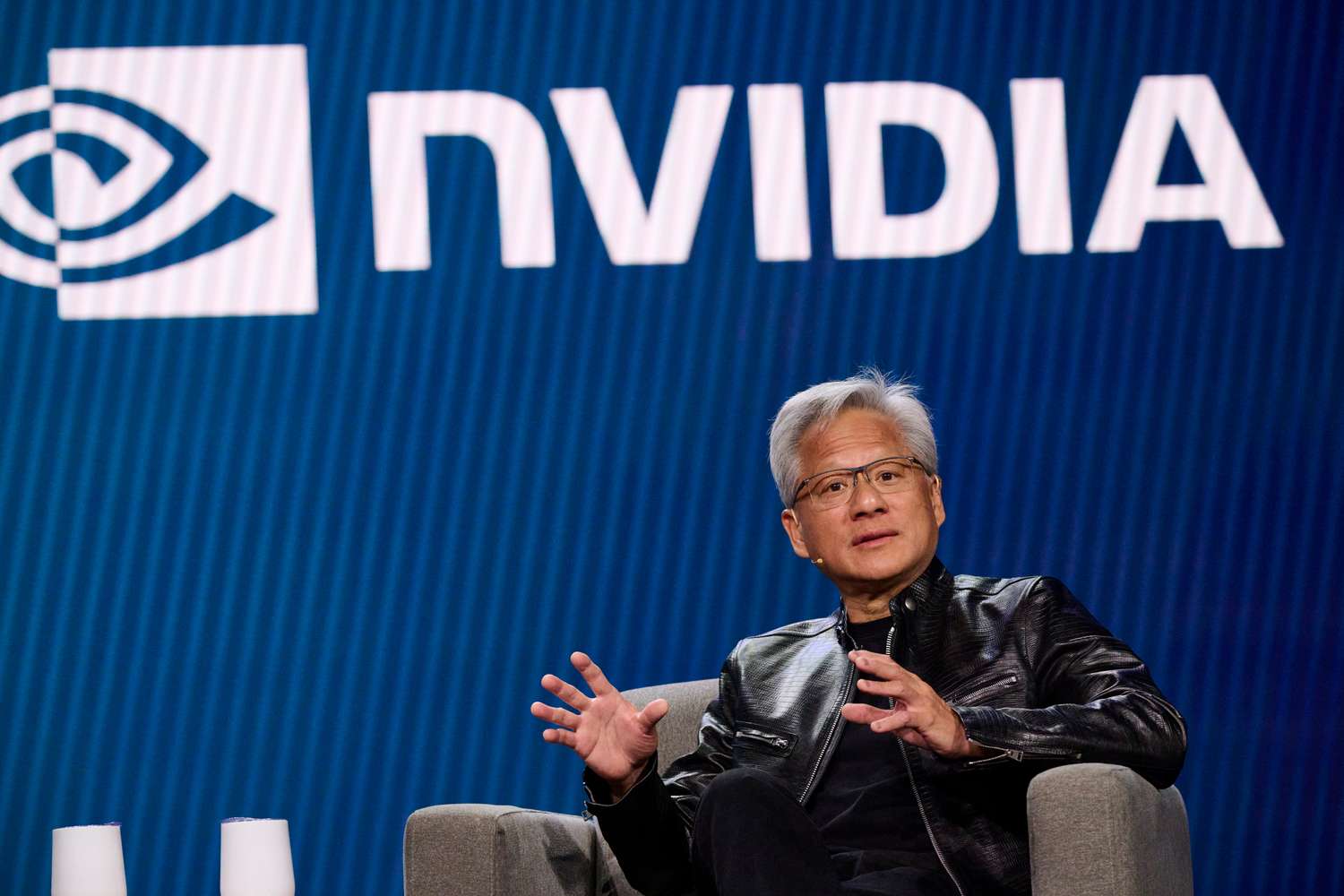 Chip Stocks Soar as Nvidia CEO Huang Says Demand Is 'Through the Roof'