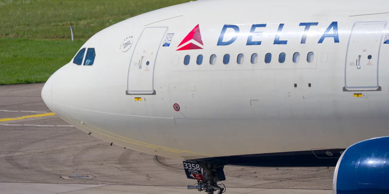 Delta reports record revenue and a profit beat, even as fuel costs surge