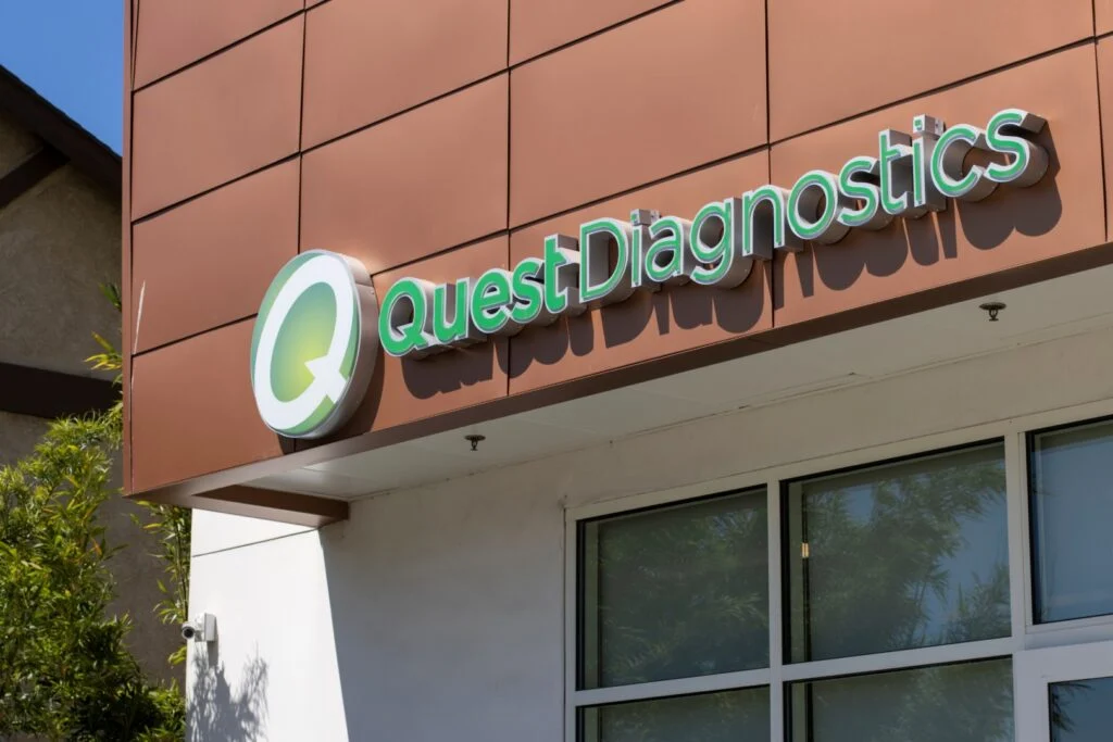 Quest Diagnostics Gains Steam With Partnerships, Lifts Outlook