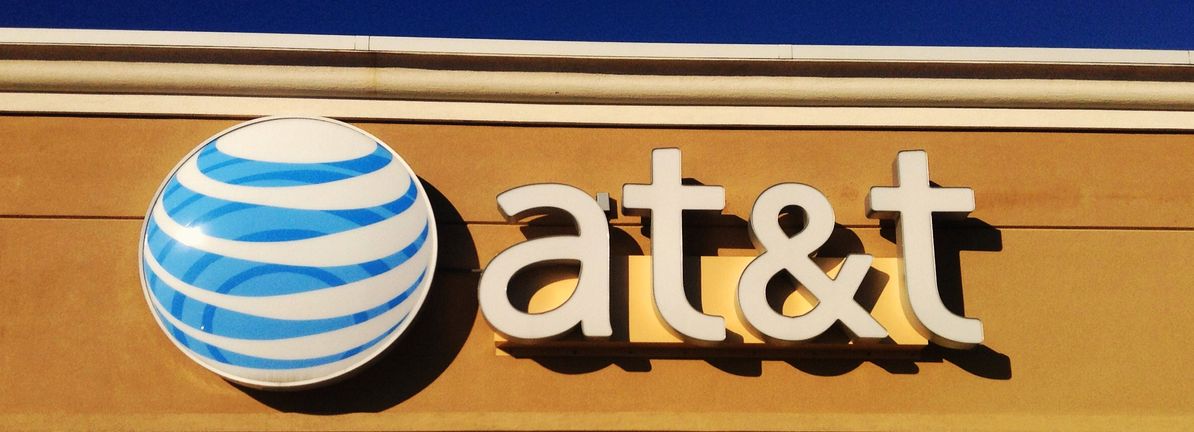 Investors more bullish on AT&T this week as stock increases 3.7%, despite earnings trending downwards over past year