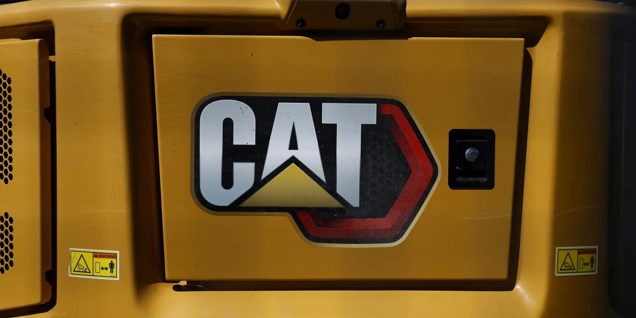 Caterpillar’s stock hits a milestone as roaring industrials rally sweeps up Wall Street
