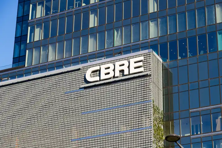 CBRE lowered to Outperform from Strong Buy at Raymond James