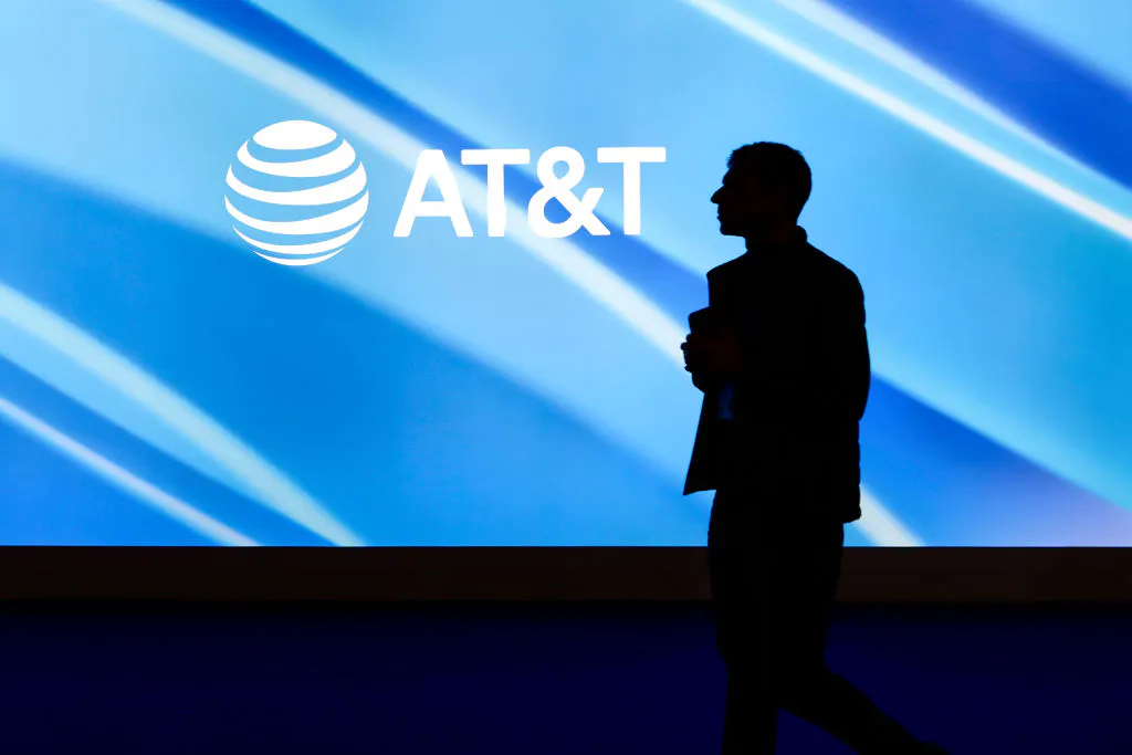 AT&T up on solid earnings