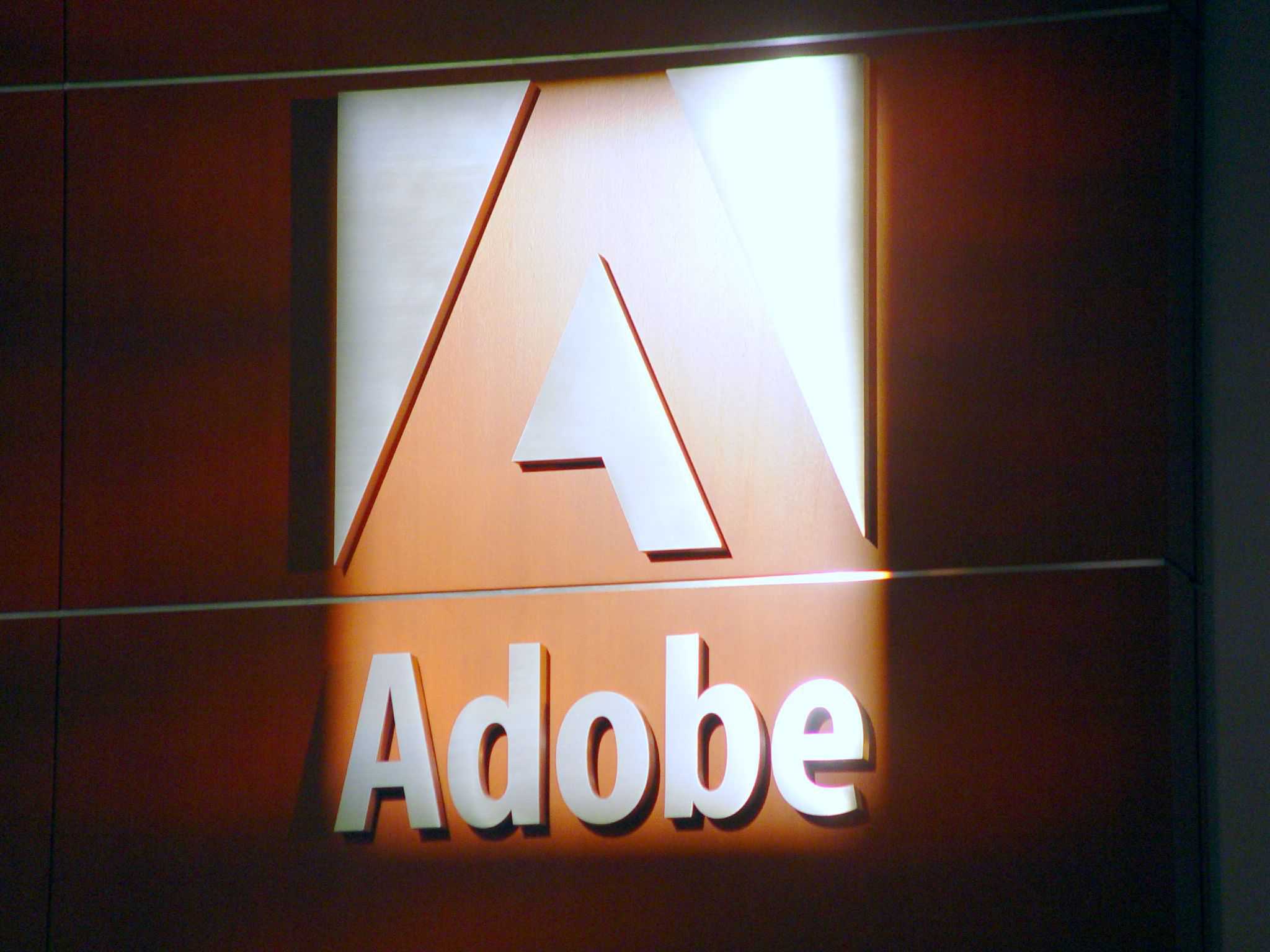 Adobe Tumbles 9% on CFO Exit, Downgrades: Is the AI Threat Now Salesforce's Problem Too?