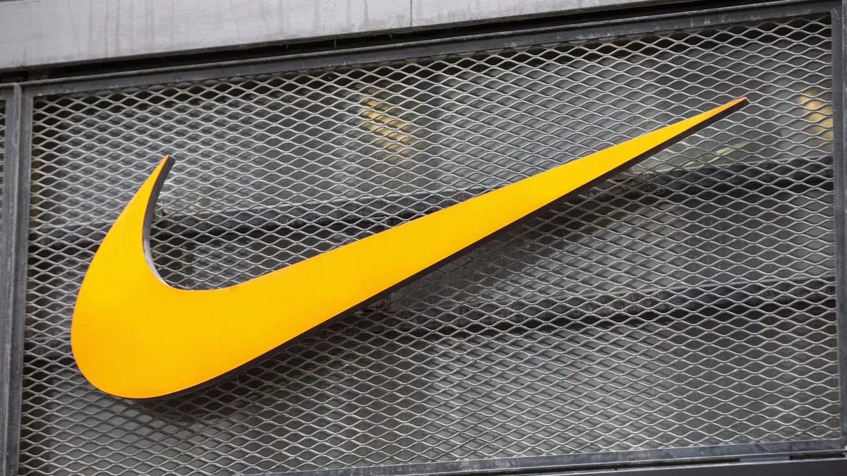 Nike stock pops 9% as its new CEO starts with an earnings beat