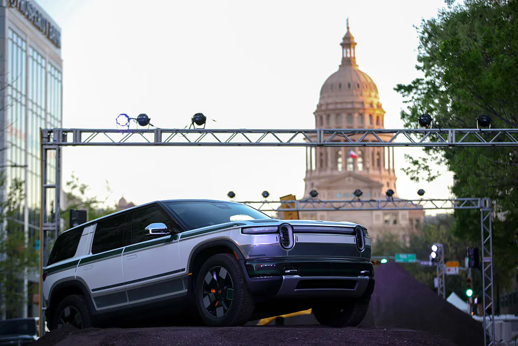 Uber will invest $1.25 billion in Rivian in a new robotaxi deal