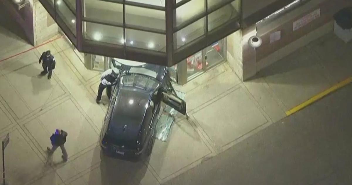 Driver arrested after car slams into River North Walgreens - CBS Chicago