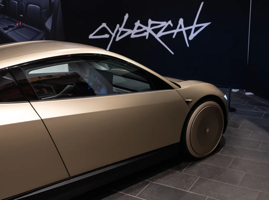 Uber and Lyft shares tap the brakes on a potential "long-term threat" from Tesla robotaxis