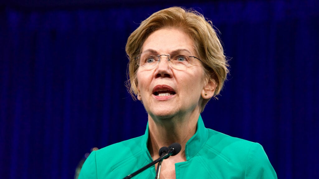 Elizabeth Warren Says Trump Selling Meme Tokens, Trading Stocks While Americans Choose 'Between Paying Rent and Buying Groceries'