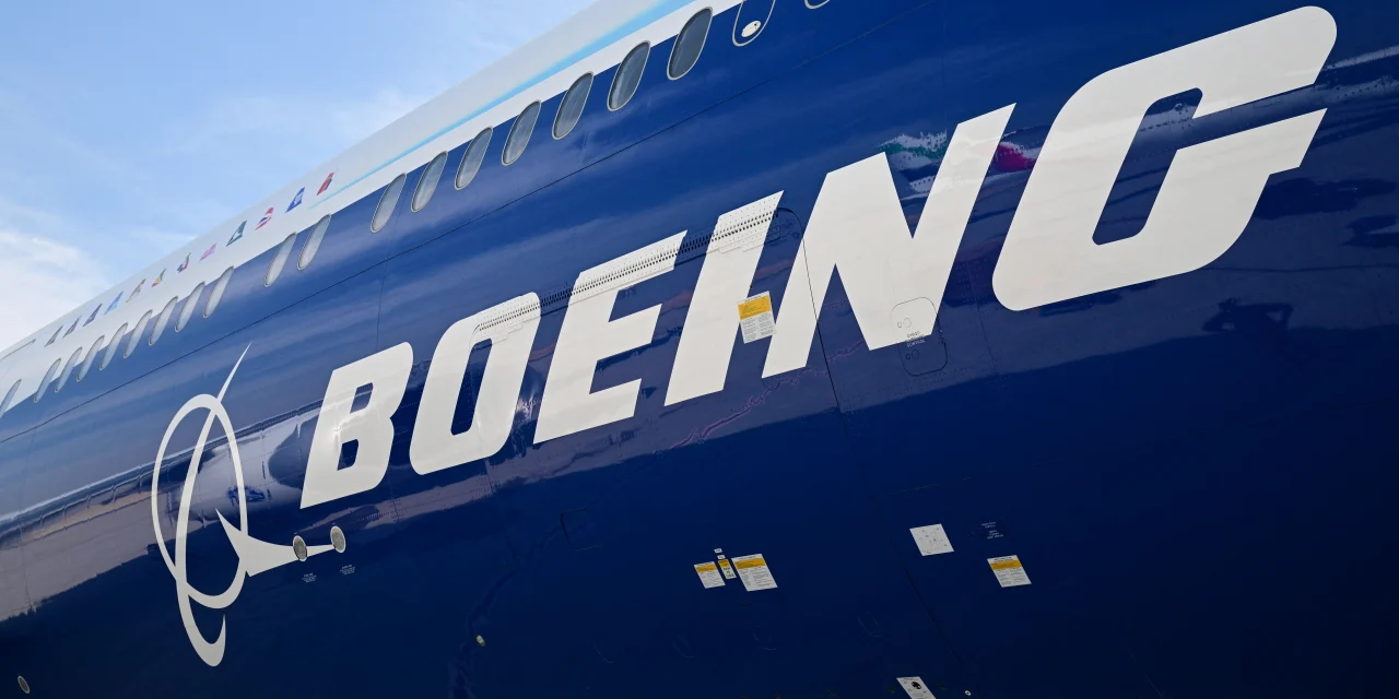 Boeing’s stock rallies as surprisingly large loss is offset by upbeat revenue and backlog