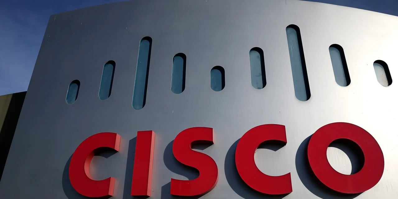 Cisco to cut jobs so it can invest more in AI, and the stock rockets toward a record