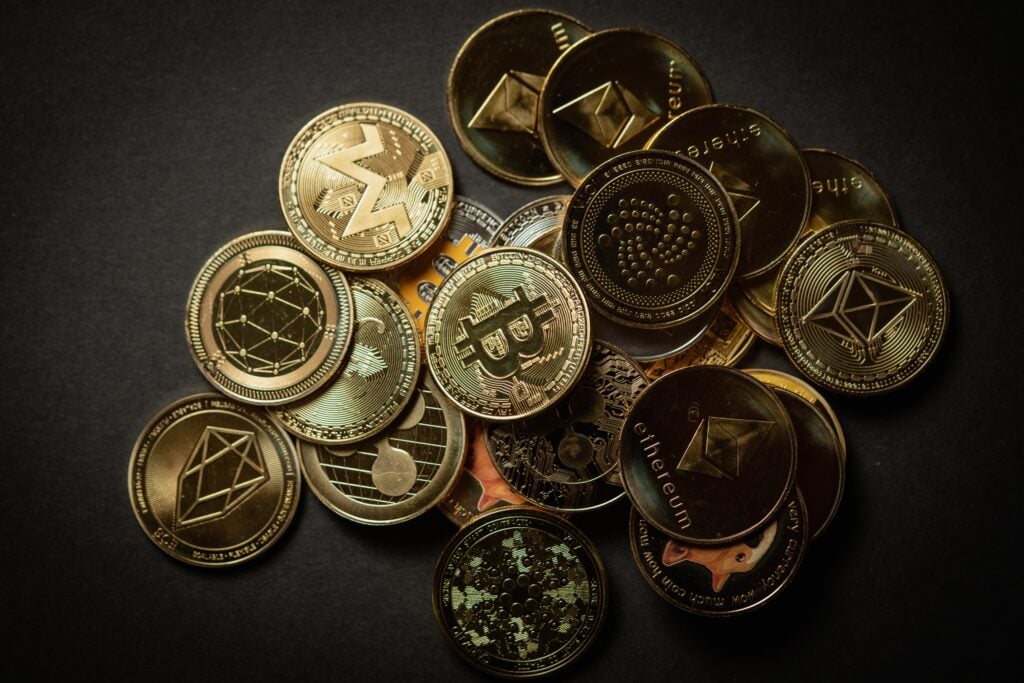 Bitcoin, Ethereum, XRP, Dogecoin End Week Quietly as Analyst Predicts 'One Last Leg Lower'