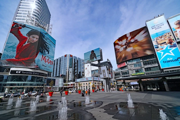 Clear Channel Outdoor gains after saying sale to Mubadala will close in early Q4