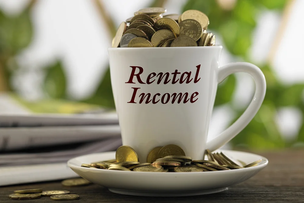 How To Earn $1,000 In Monthly Rental Income While You Sleep (Without The Landlord Duties) - Realty Income - Benzinga