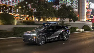 Uber jumps after unveiling Lucid robotaxi at CES