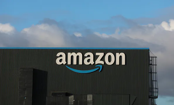 Two charts that show why Amazon is building a giant physical store