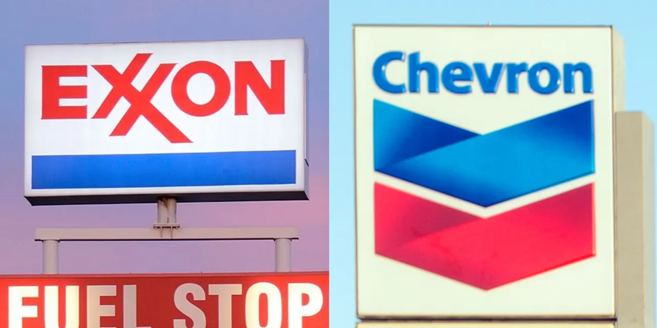 Chevron, Exxon plan to keep boosting oil production, even as crude gets cheaper. What gives?