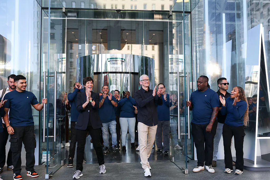 Apple posts record quarterly revenue and iPhone sales