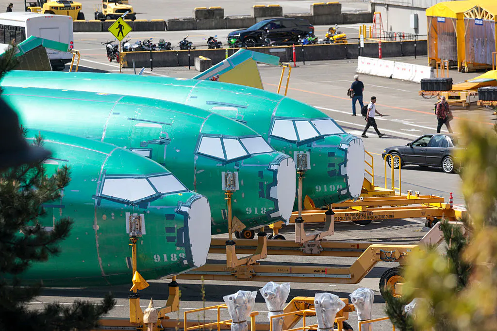 Boeing delivered 44 jets in November, down 17% from October and trailing Airbus