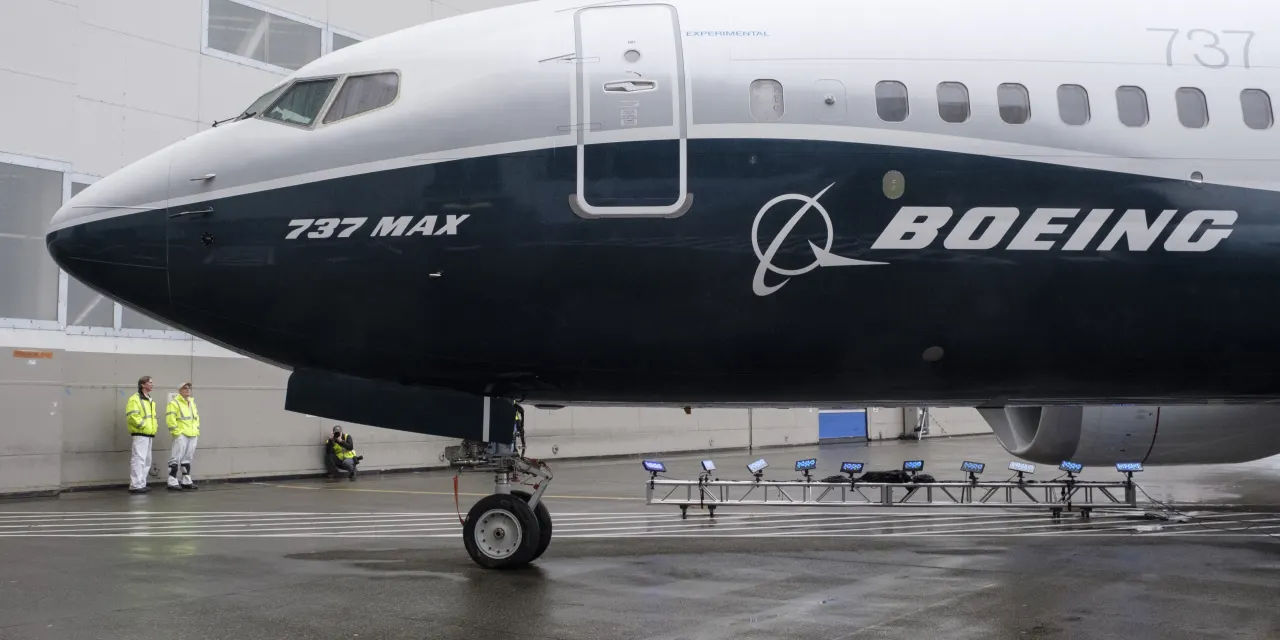 Boeing clears key hurdle and stock rallies, leading the Dow