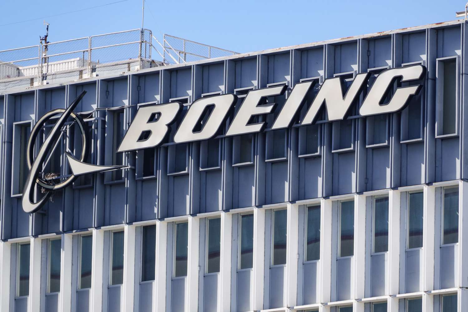 Top Stock Movers Now: Boeing, Intel, Sandisk, and More