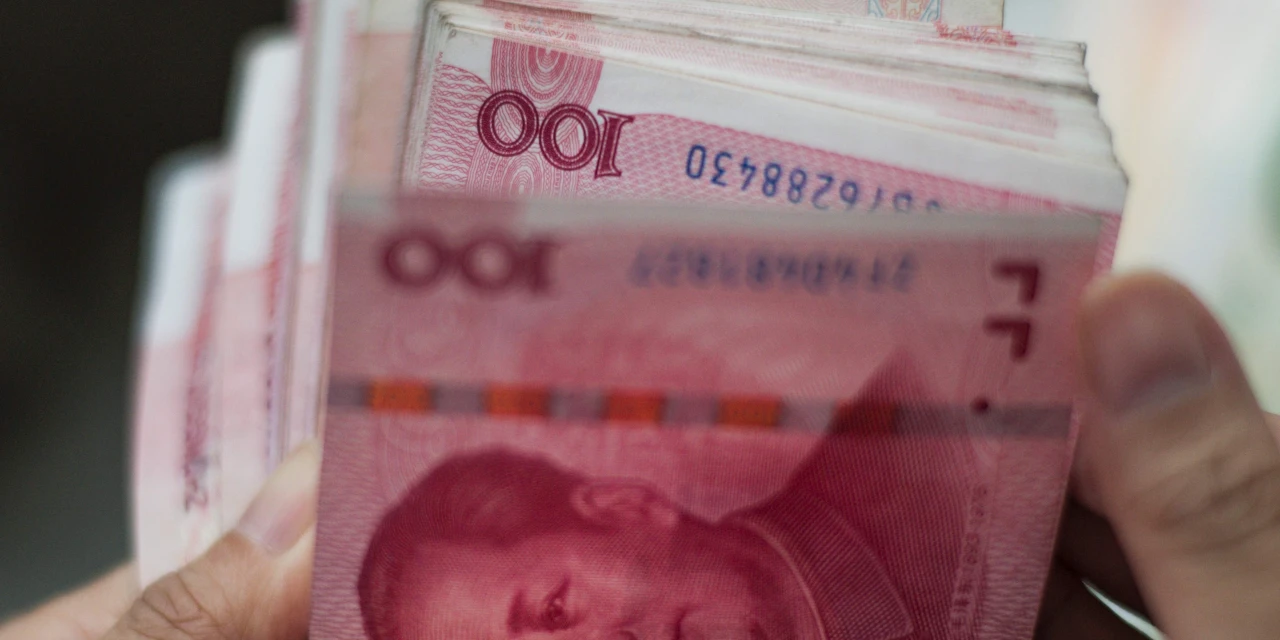 China’s Forex Reserves Rose in December as Yuan Debate Mounts