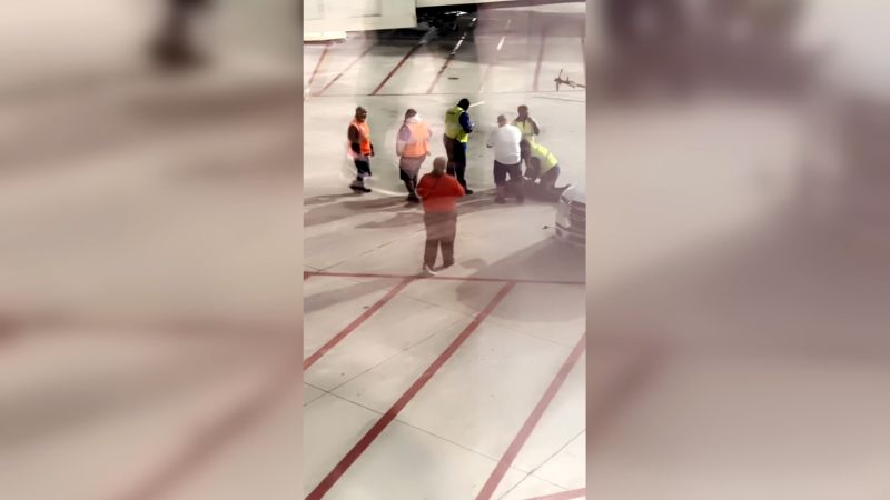 Southwest Airlines passenger opened emergency exit, climbed onto the wing while aircraft at gate in New Orleans - CNN