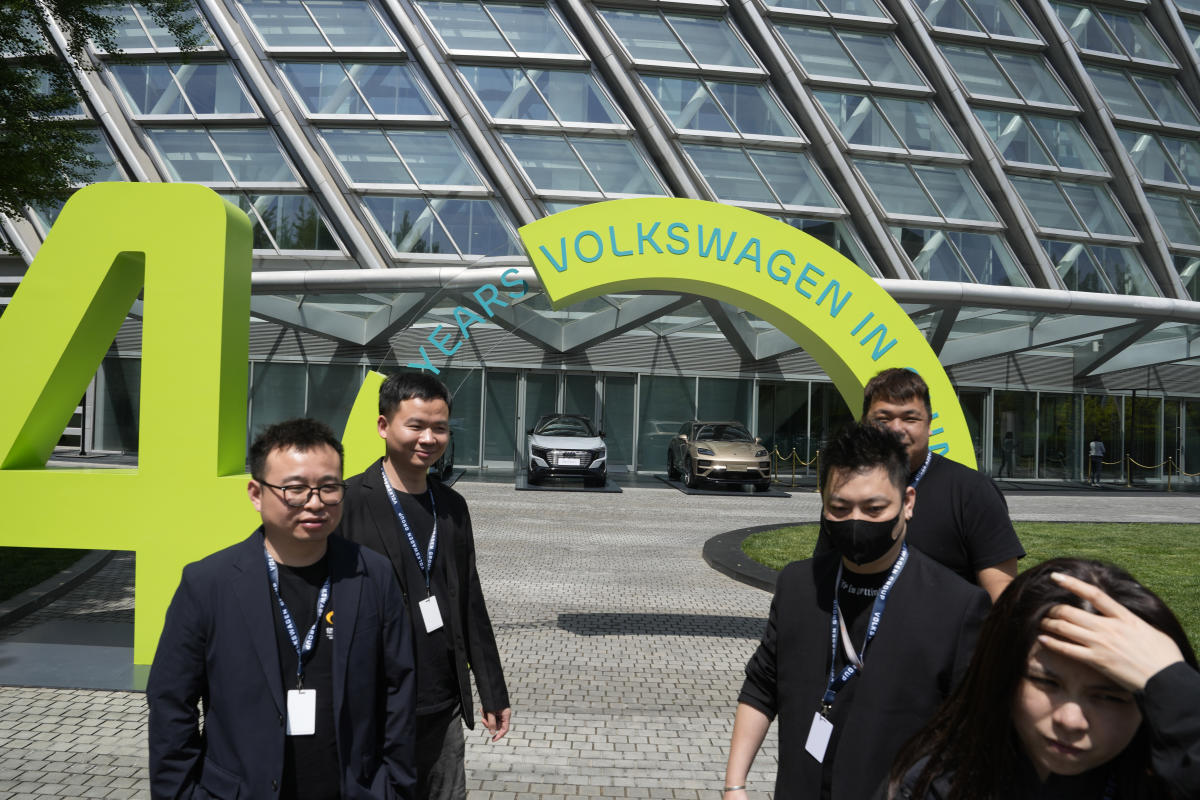 Volkswagen revamps its approach in China in bid to overtake upstart EV makers - Yahoo Finance