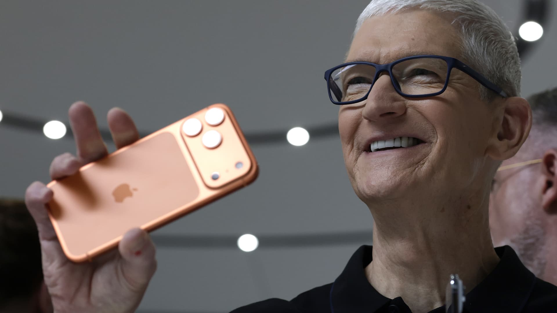 Apple eyes iPhone growth in first earnings report since Tim Cook's announced exit