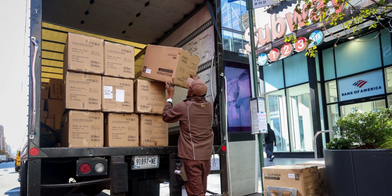 UPS Cut 48,000 Jobs in Management and Operations