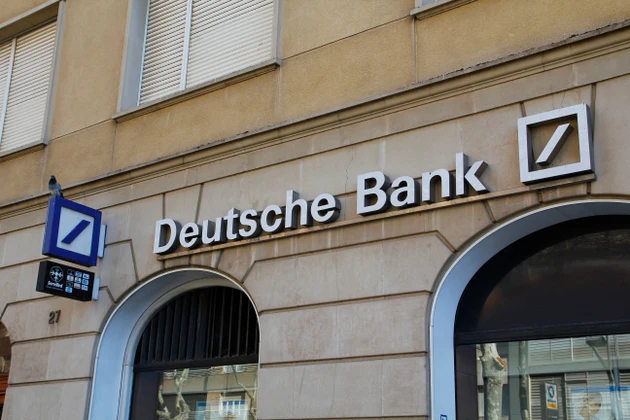 Deutsche shareholders urge management to control costs during AGM - report