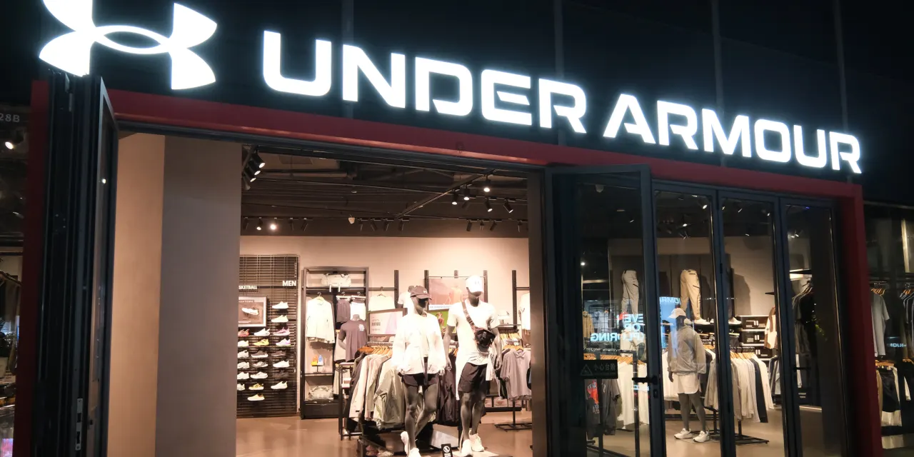 Under Armour turns a surprise profit, even as turnaround plan costs keep rising