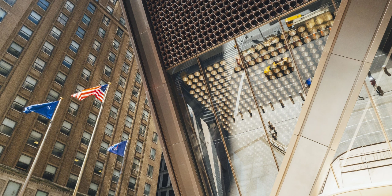 JPMorgan Reports Higher Profit and Revenue as Economy Chugs Along