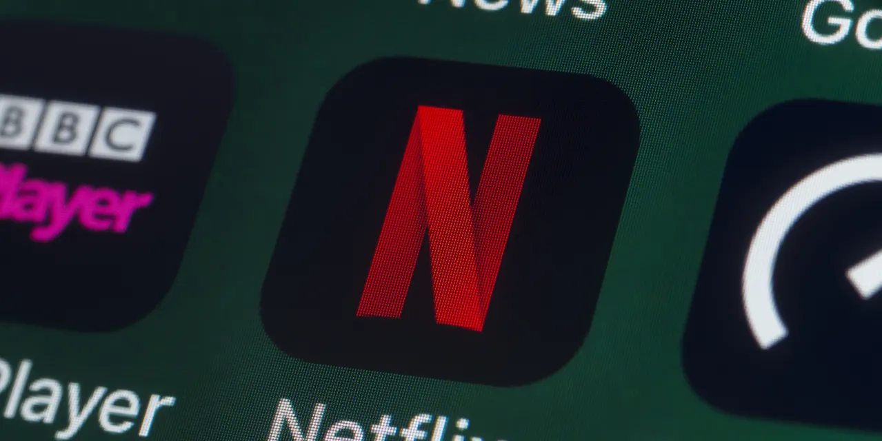 Netflix’s stock remains under pressure as investors balk at forecast and Warner Bros. acquisition