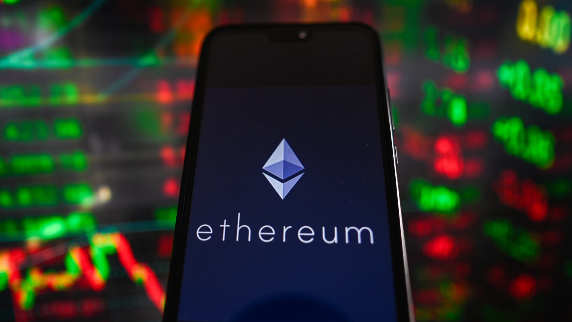 Ether surges, trading close to its record again after Powell speech teasing rate cuts