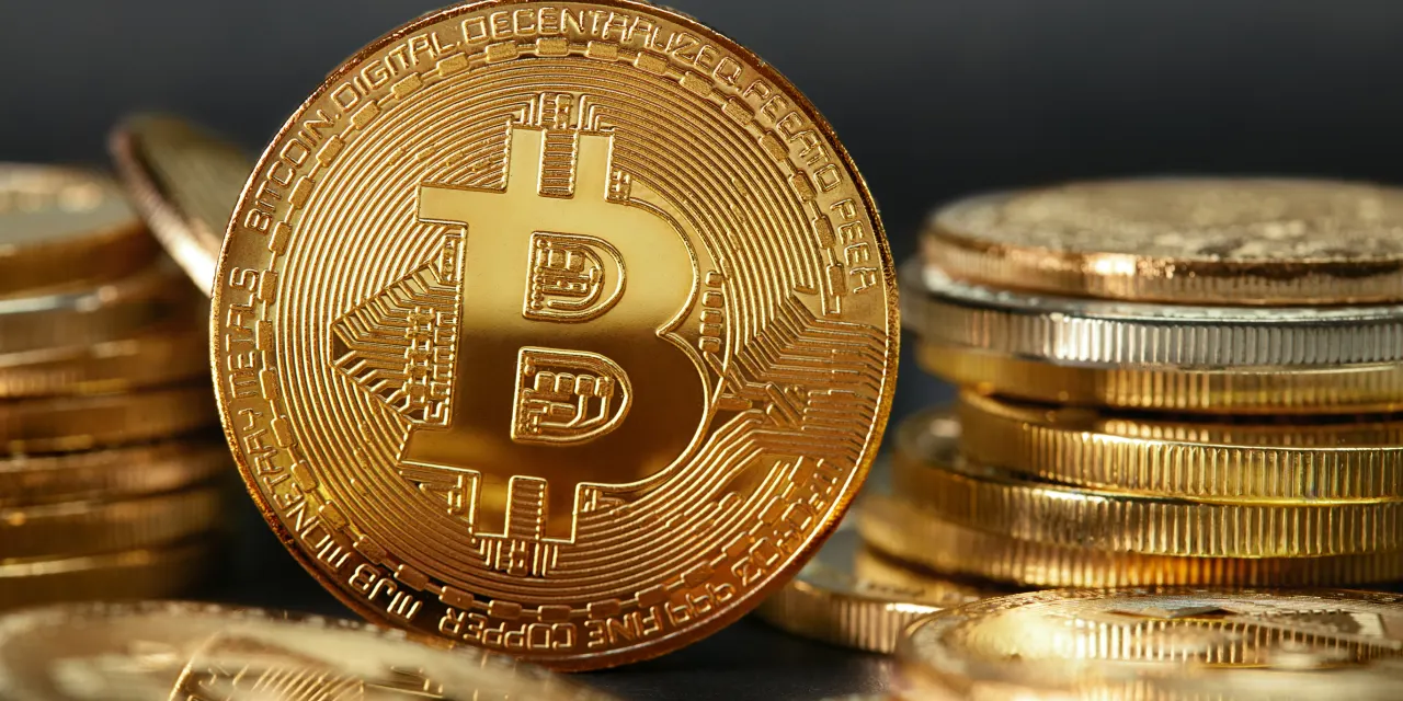 Bitcoin and XRP Struggle Again. Why Coinbase, Robinhood, and Strategy Stocks Are Rising.